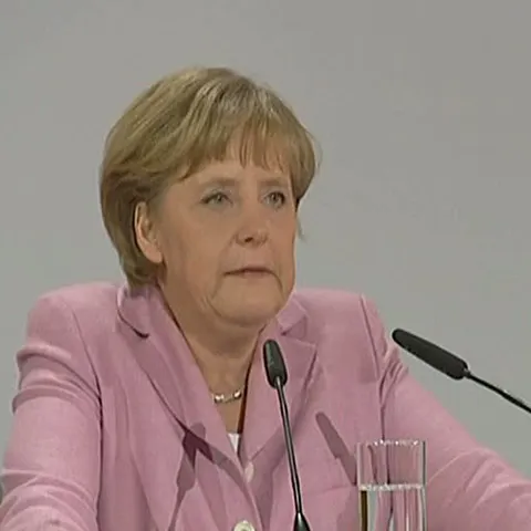 Angela Merkel, şefă a ţării şi a prăjiturilor făcute în propria casă!