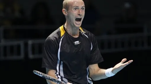 Davydenko l-a învins în premieră pe Federer şi va juca finala Turneului Campionilor cu Del Potro