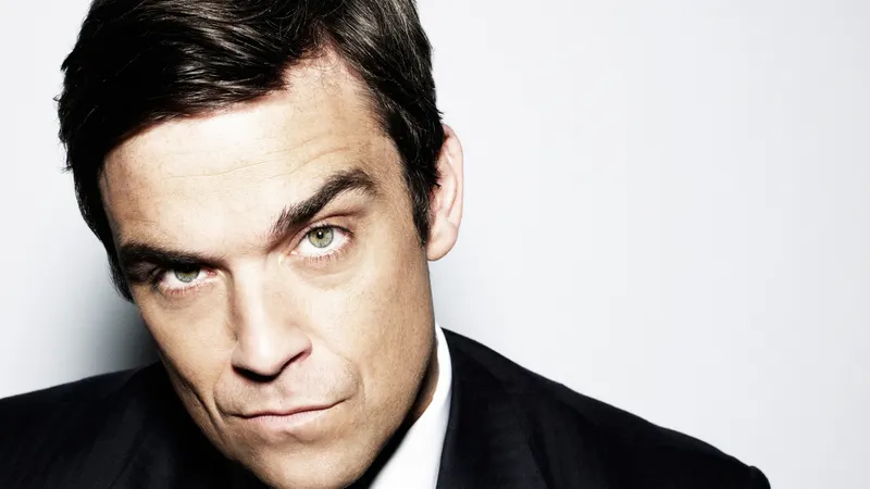 Cine cânta în deschiderea Robbie Williams în România