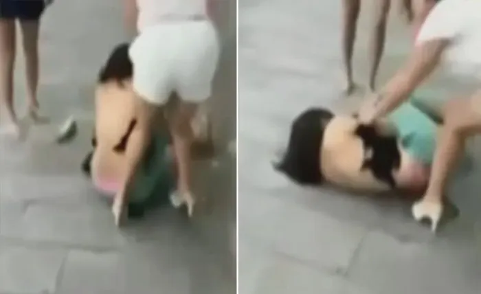 A fost prinsă de soția amantului și dezbrăcată pe stradă. Scene șocante 