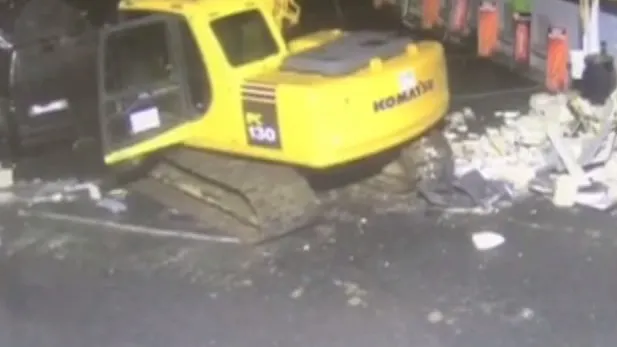 Au furat bancomatul cu excavatorul
