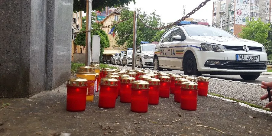 Criminalul încarcerat, polițistul înmormântat