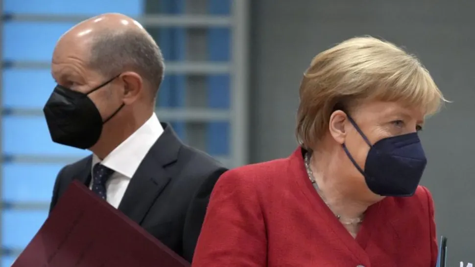 Germania va introduce noi RESTRICȚII de marți! Întâlnire între Angela Merkel și succesorul său Olaf Scholz