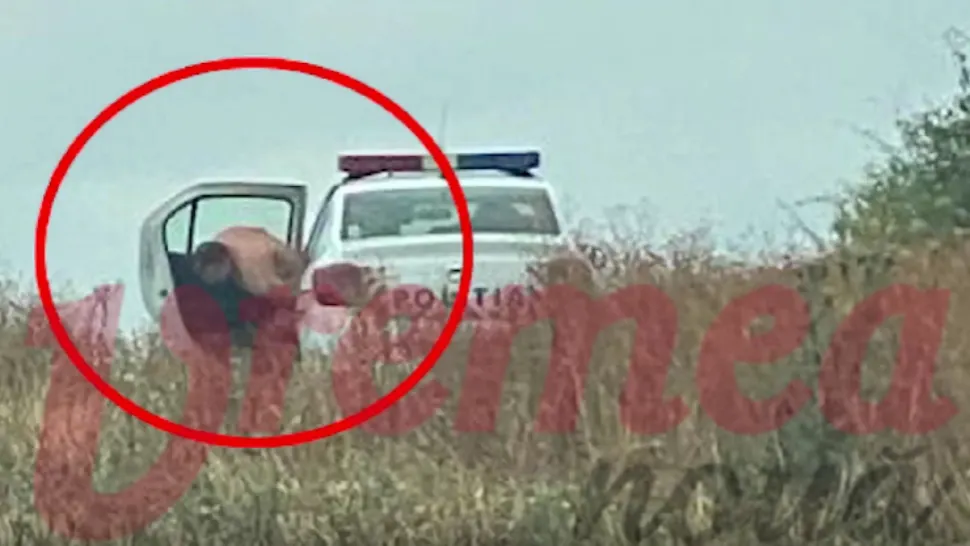 Șef din Poliția Vaslui, pozat GOL pe câmp, lângă autospecială! Explicațiile, HALUCINANTE: ce MĂSURI s-au luat