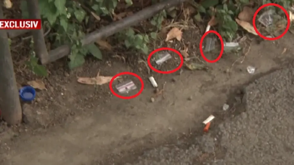Consumatorii de droguri NU se mai ascund! Tinerii, filmați de la geam în timp ce par că prizează - Imagini exclusive din Centrul Capitalei