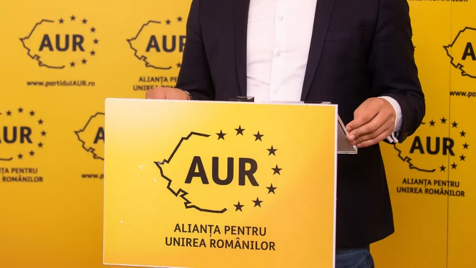 Un nou scandal în partidul lui Simion. Un membru AUR, prins în flagrant când primea mită. A fost exclus - SURSE
