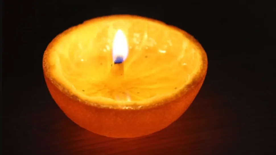 Trucul genial prin care îți faci propria candelă BIO cu care parfumezi toată casa. Tot ce îți trebuie este o coajă de portocale și niște ulei esențial