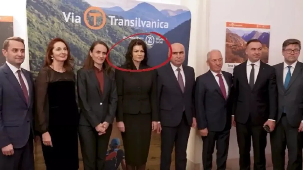 Partenera lui Ilie Bolojan, prezentă lângă el la Viena, a devenit „soție”. Cel puțin așa spune purtătoarea de cuvânt Ioana Dogioiu
