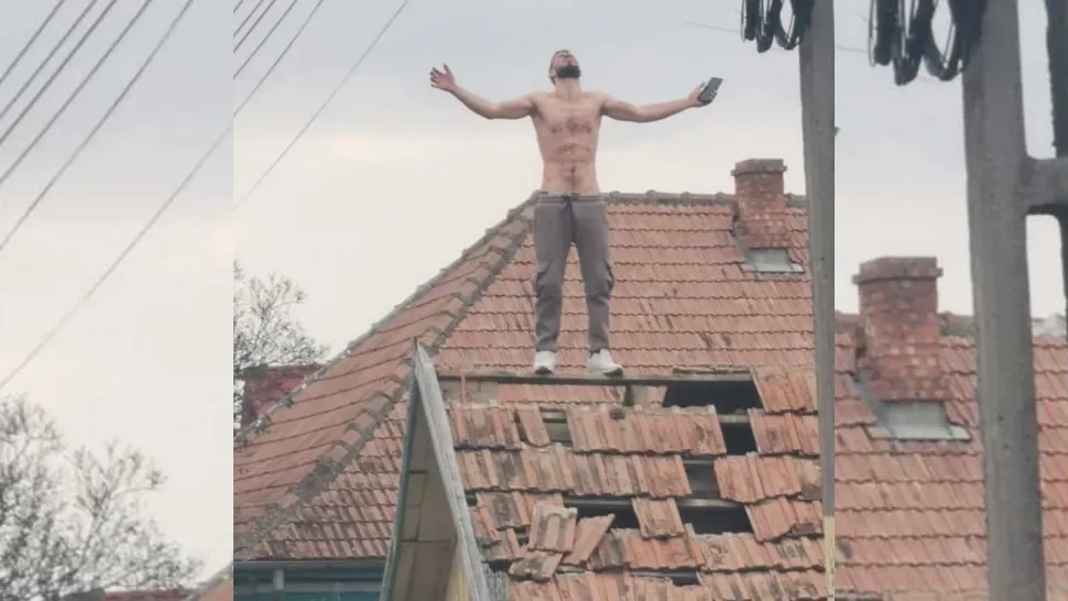 Scene șocante în județul Bacău. Un tânăr aflat sub influența alcoolului s-a urcat pe o casă și a aruncat cu țigle înspre polițiști-VIDEO 