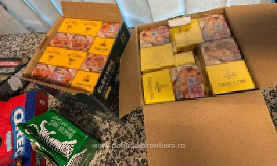Țigări de contrabandă descoperite pe Aeroportul Otopeni: marfă ascunsă în cutii de dulciuri și electronice