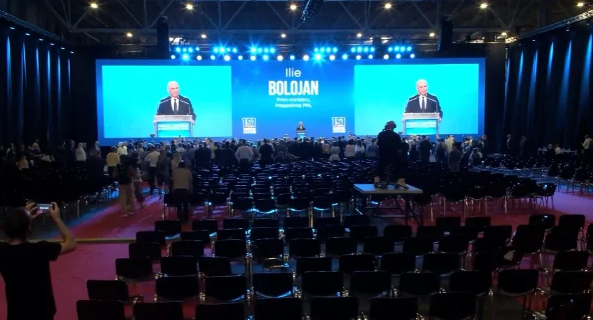 Situație penibilă pentru Bolojan. Scaune goale când a vorbit