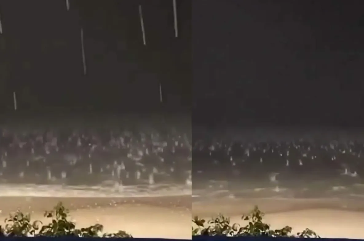  Furtună cu grindină pe o plajă aglomerată. Turiștii au fugit pentru a se adăposti