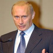 Vladimir Putin şi cancelarul Angela Merkel încearcă să rezolve dosare dificile
