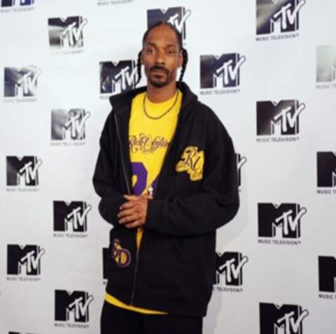 Snoop Dogg cere ajutorul Madonnei şi lui Beckham pentru a putea reveni în Marea Britanie