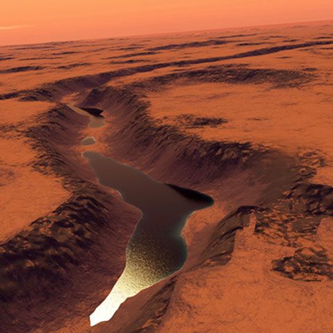 Cercetătorii au descoperit un canion si un fost lac pe Marte
