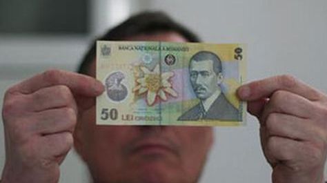 18 membri ai unei reţele de falsificatori de bancnote au fost reţinuţi