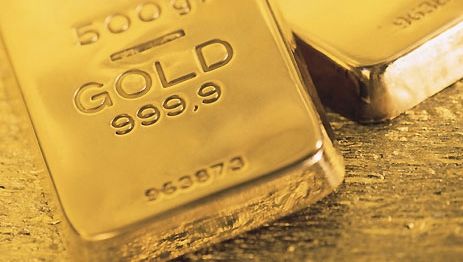 Preţul aurului a atins un nou record, susţinut de tendinţa de depreciere a dolarului