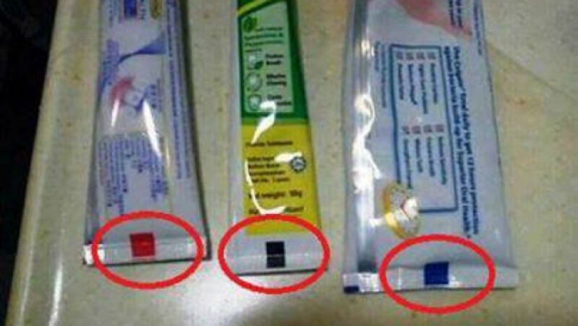 “Verde e natural, negru e toxic”. Adevărata semnificație a semnelor de pe tuburile de pastă de dinți