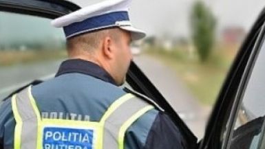 Beat criţă, la volanul unui TIR. Ce alcoolemie avea un şofer oprit de poliţişti pe E85