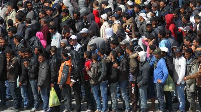 Criza imigranților. Câți refugiați trec zilnic frontiera dintre Grecia și Macedonia 