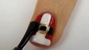 Iată cum îţi poţi picta pe unghii hainele lui Moş Crăciun şi ale elfilor