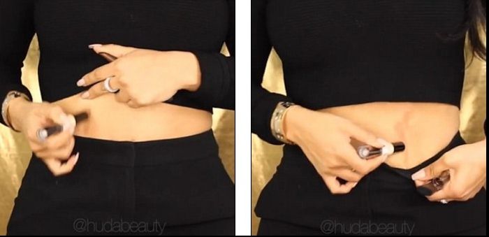 A luat fondul de ten și a început să deseneze linii pe abdomen. Rezultatul, peste așteptările ei