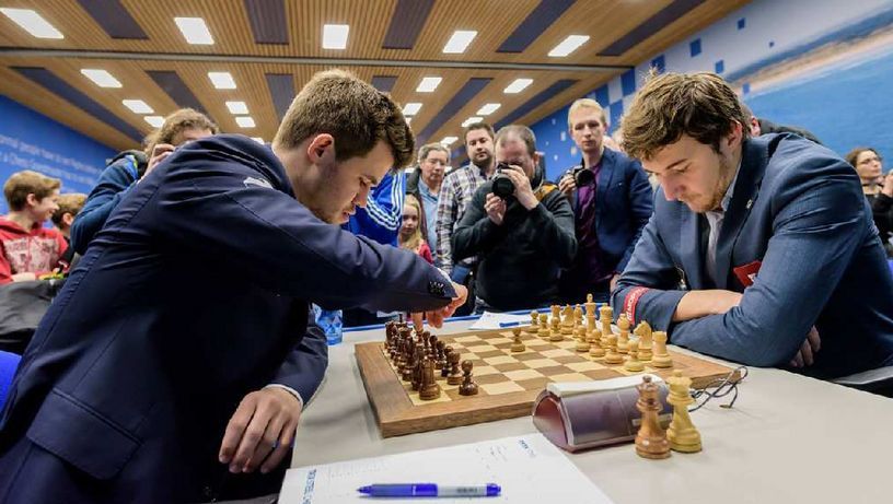 Egalitate în partida III a meciului pentru titlul mondial dintre Magnus Carlsen și Serghei Kariakin 