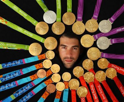 Michael Phelps şi-a expus pentru prima oară toate cele 28 de medalii olimpice într-un pictorial