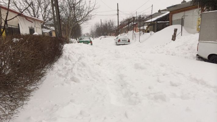 Lovitură dură. Ce au pățit cetățenii care au aruncat zăpada curățată pe carosabil