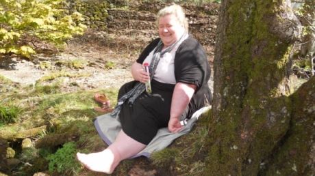 Cum arată această femeie după ce a slăbit mai mult decât întreaga greutate a soţului ei