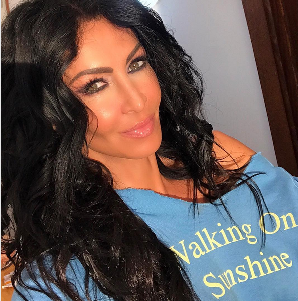 Mihaela Rădulescu, la 49 de ani. A apărut fără sutien, la plajă