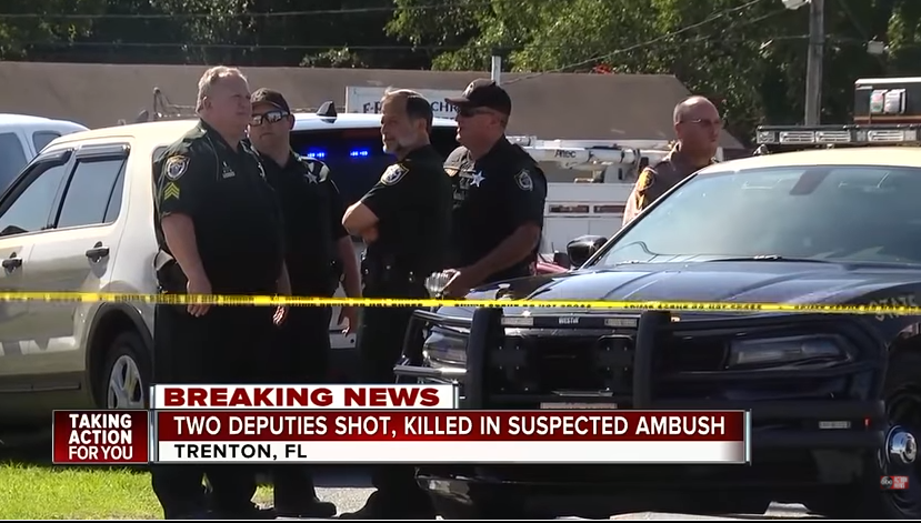 Polițiști împușcați mortal în restaurant(Video)