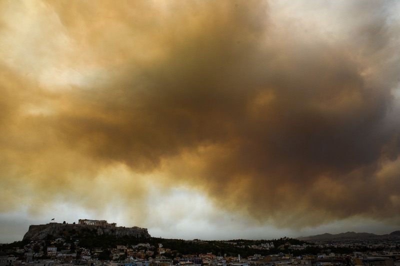Imagini apocaliptice din Atena. Capitala Greciei, acoperită de un fum sufocant