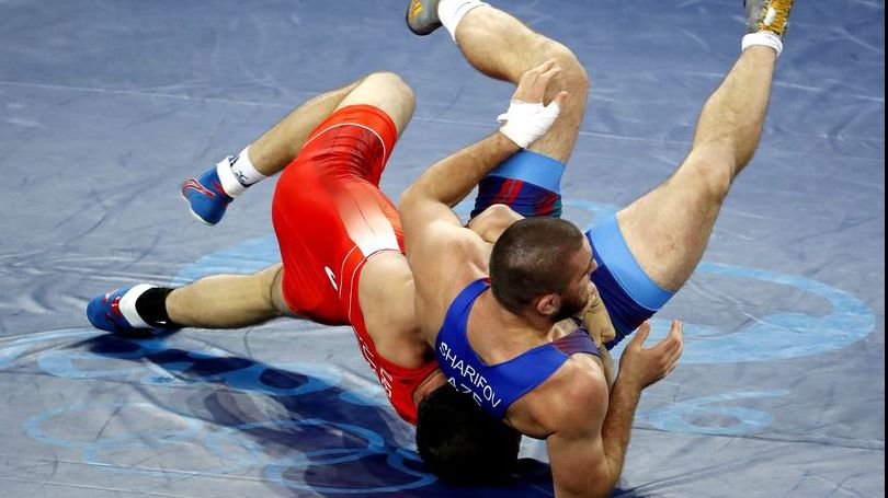 Luptătorii ruşi Zurab Kapraev şi Nikolai Okhlopkov au primit cetăţenia română