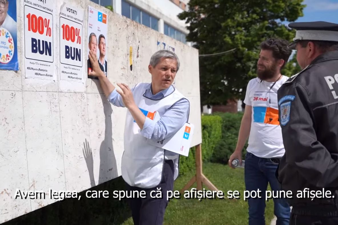 Dacian Cioloș, chestionat de un polițist local din Teleorman pentru că lipea afișe electorale