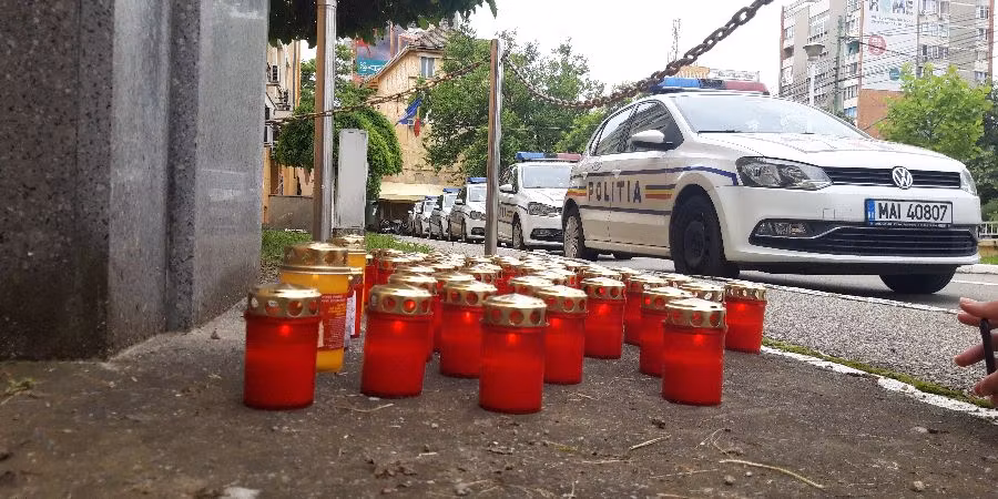 Criminalul încarcerat, polițistul înmormântat