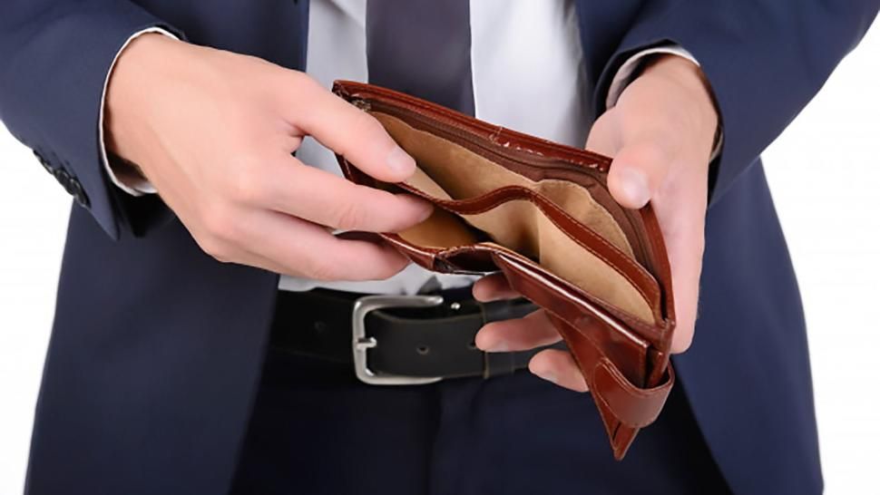 Scad salariile romanilor din Marea Britanie - Decizia care ii va afecta