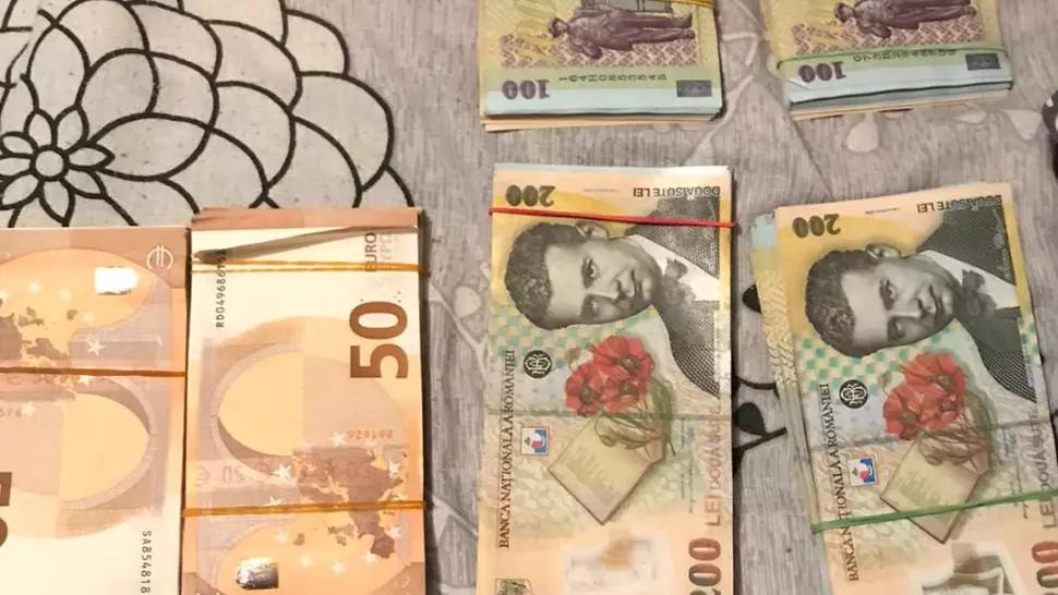 Ordin european de anchetă în România: DIICOT a destructurat un grup infracțional specializat în fraudă informatică și spălare de bani