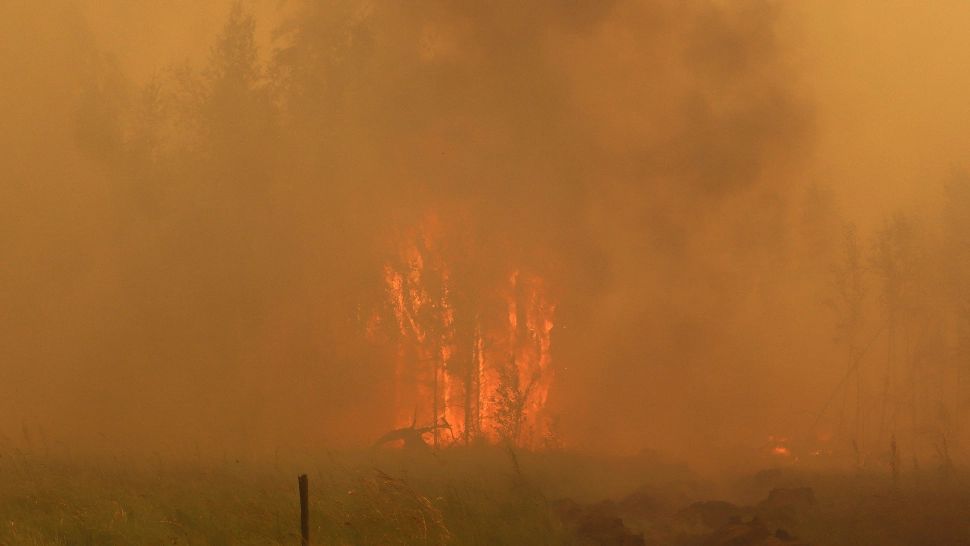 Incendii MASIVE de vegetație în Siberia: Fumul gros a ajuns până la Polul Nord - Imagini APOCALIPTICE