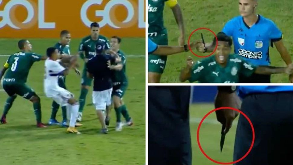 VIDEO - Un spectator a intrat cu un cuțit, pe gazon, în timpul unui meci de fotbal și a început să-i alerge pe jucători