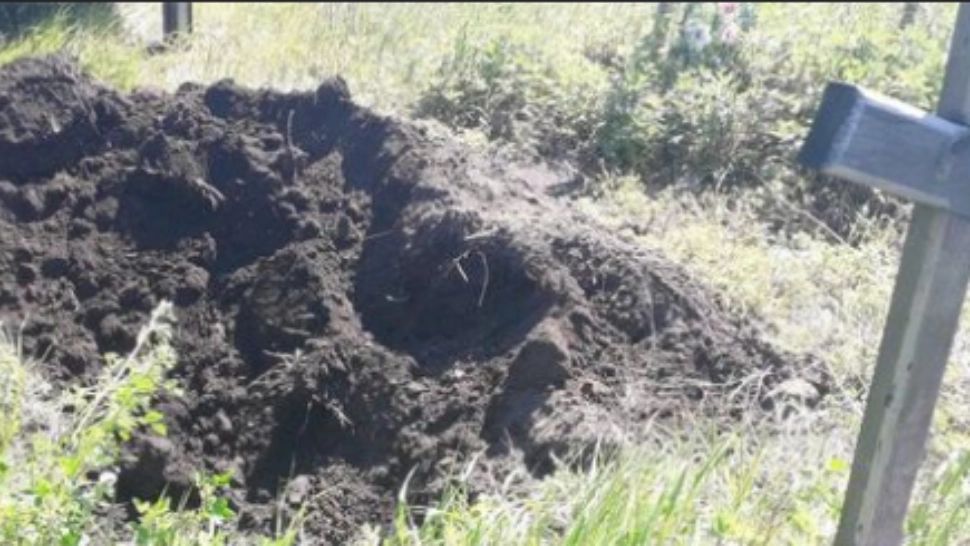 Colonel rus, îngropat la marginea drumului de ucraineni