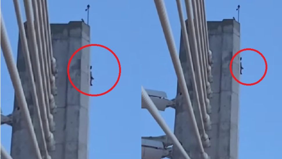 Un bărbat s-a urcat pe un pilon al Pasajului Basarab și amenință că se aruncă în gol - VIDEO