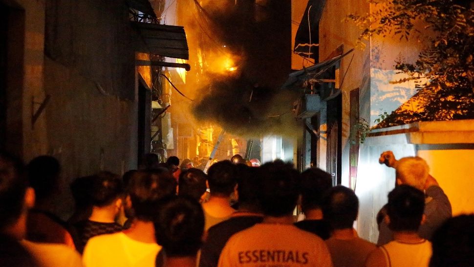 Incendiu devastator, într-un bloc din Hanoi, Vietnam: zeci de morți și răniți - FOTO