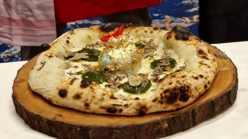 Pizza cu foiță de aur și trufe negre, noua fiță în materie culinară. Ciocolata de Dubai riscă să devină istorie