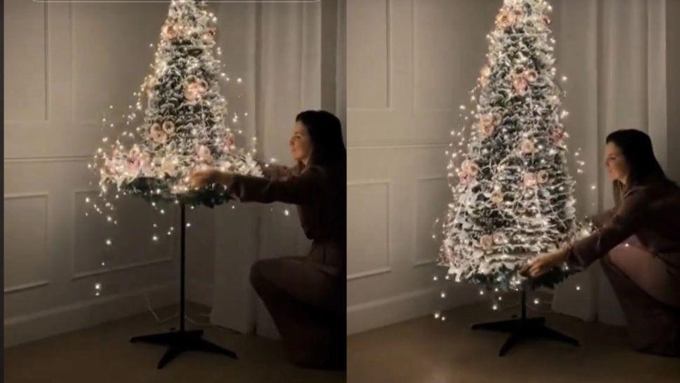 S-a inventat bradul de Crăciun gata într-un minut. Vine cu tot cu decorațiuni și tot ce trebuie să faci este să îl tragi în jos