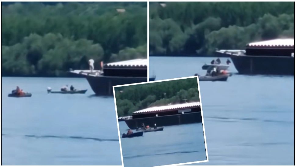 Momentul în care barja a lovit cele două bărci de pesacari pe Dunăre. Doi bărbați sunt în continuare de negăsit-VIDEO