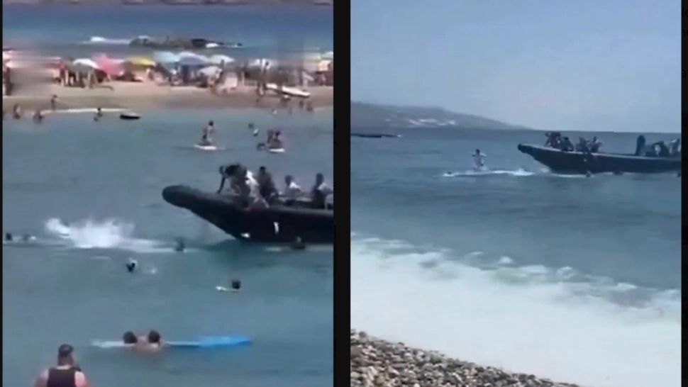 Video. Momentul în care migranții veniți pe barcă iau cu asalt o plajă din Spania. Reacția localnicilor, demnă de un film de acțiune 