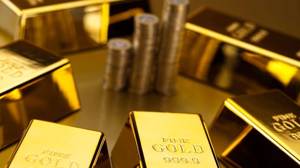 Prețul aurului şi al argintului şi-a revenit marţi, după prăbuşirea istorică recentă