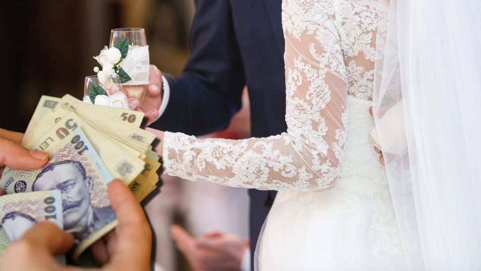 Cât este darul la nuntă în 2026. Ce sumă trebuie să scoți din buzunar dacă ești naș 