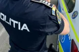 Doi polițiști din București, arestați într-un dosar de corupție. Procurorii acuză că au introdus alcool și un telefon mobil în arest
